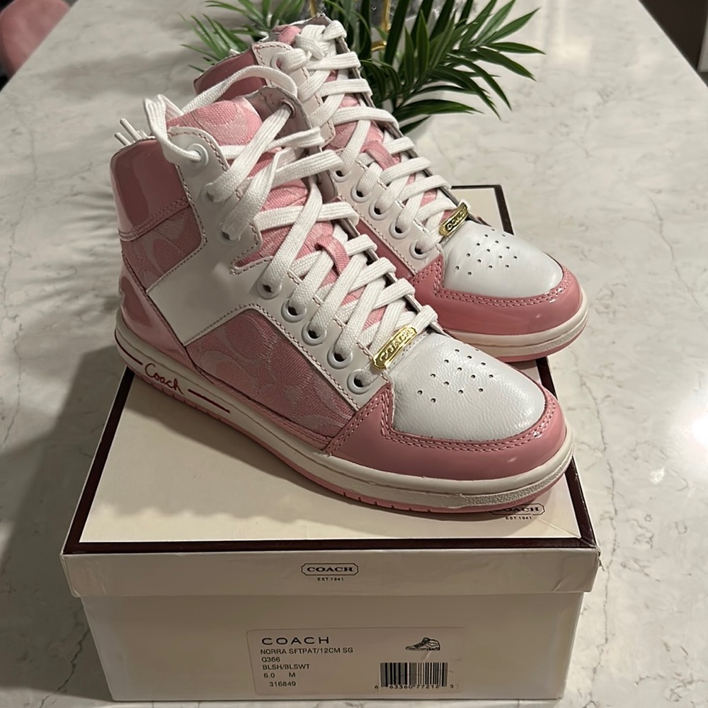 Coach high top sneakers in a beautiful baby pink and white